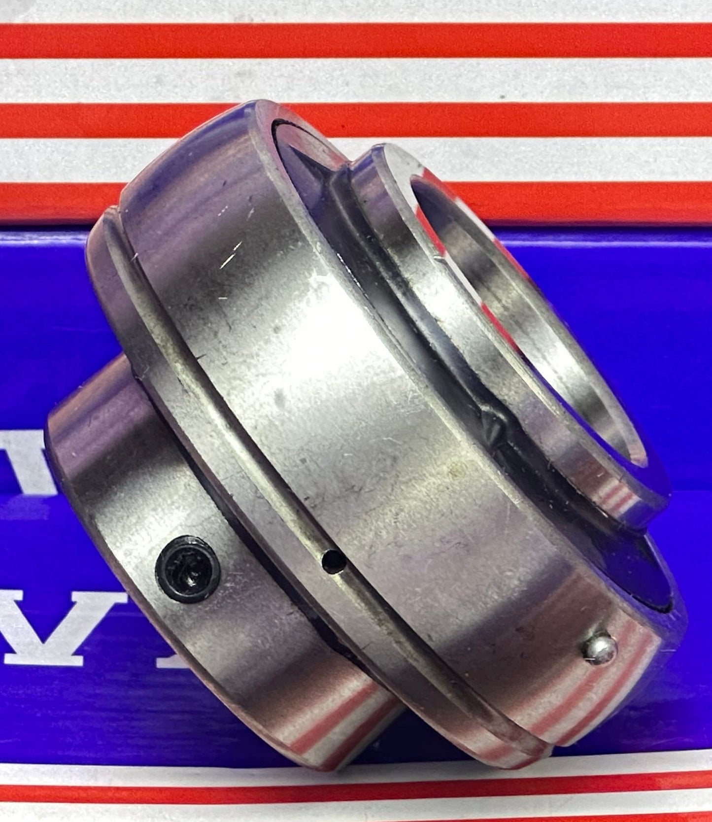 UC206-19 محمل إدخال 1 3/16" مركب