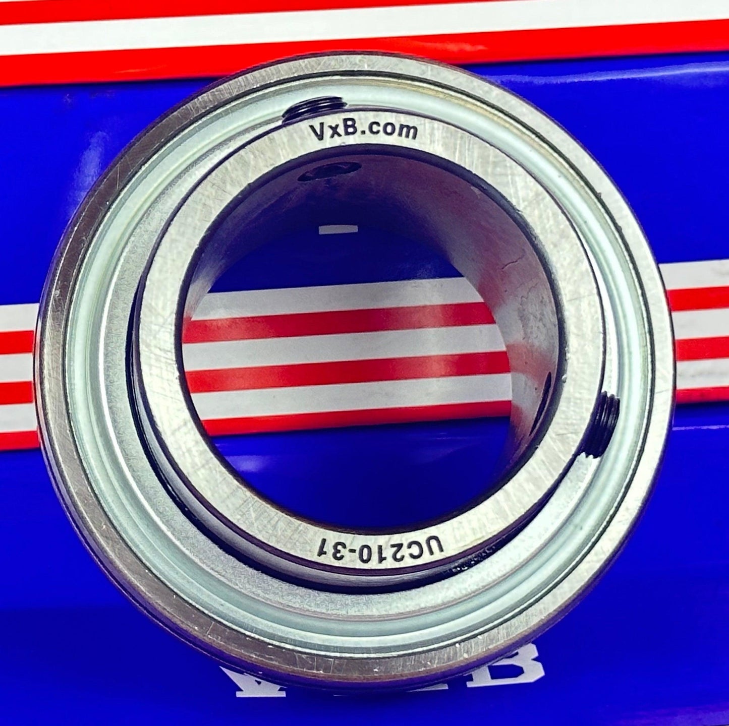 UC210-31 محمل إدخال 1 15/16" مركب